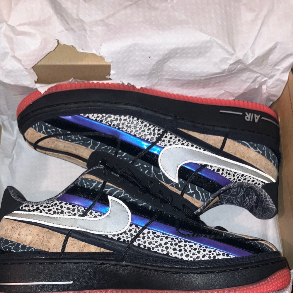 Nike Air Sneakers with Black, Blue, and Red Accents